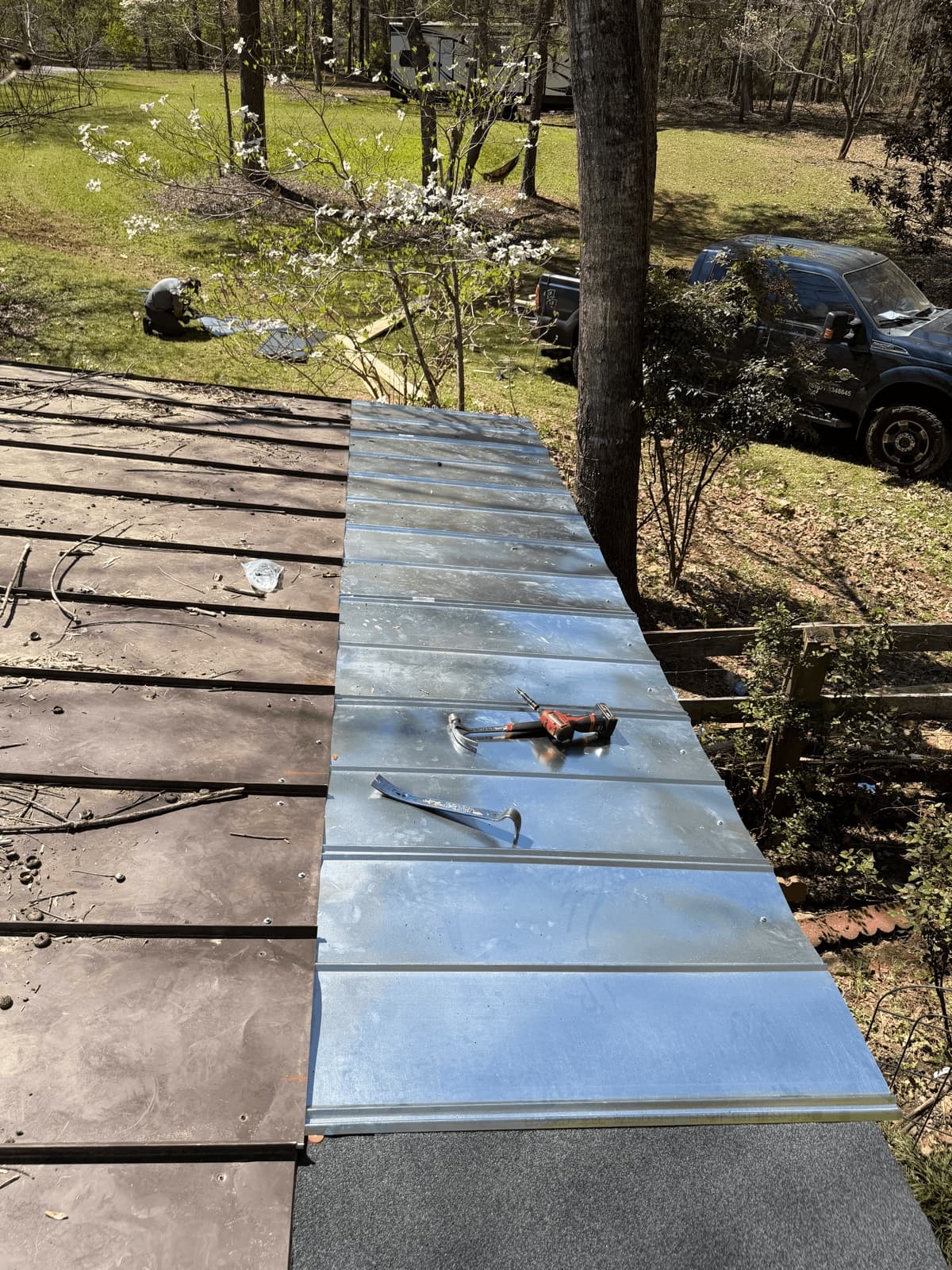 Metal roofing panel installation